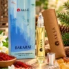Aksa BAKARAT Roll-On Esans şişesi, açık bilyeli başlığı ve kahverengi kılıfı