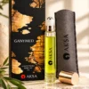 Aksa Ganymed Roll-on Esans 9 ml kutusu, şişesi ve gri kılıfı sade dekorla