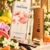 Aksa Gold Fresh Coture Roll-on Esans şişesi, kutusu ve kahverengi kılıfı