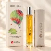 Aksa RED HILL 9 ml Roll-On Esans kutusu ve amber renkli esans şişesi